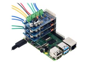 Three Motoron M3H256 controllers being controlled by a Raspberry Pi.